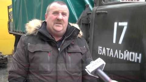 Кадр сюжету: «Сепарську» вантажівку для наших бійців відремонтували волонтери